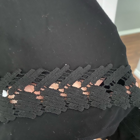 Cleo stretchy light tunic. Open detail along the bottom. 3/4 sleeve - Picture 1 of 3